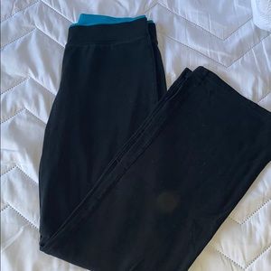 Black yoga pants with blue waistline, size small